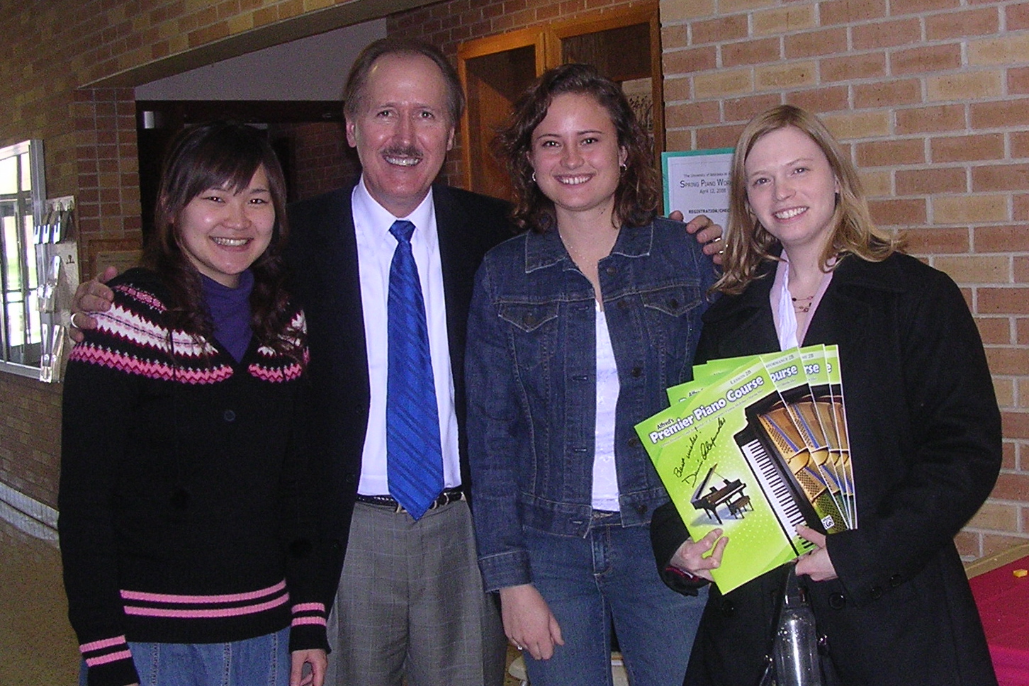 With another door prize winner, and Hikari Maekawa who played the Grieg concerto for me.